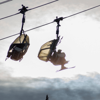chairlifts with rider and weather screens