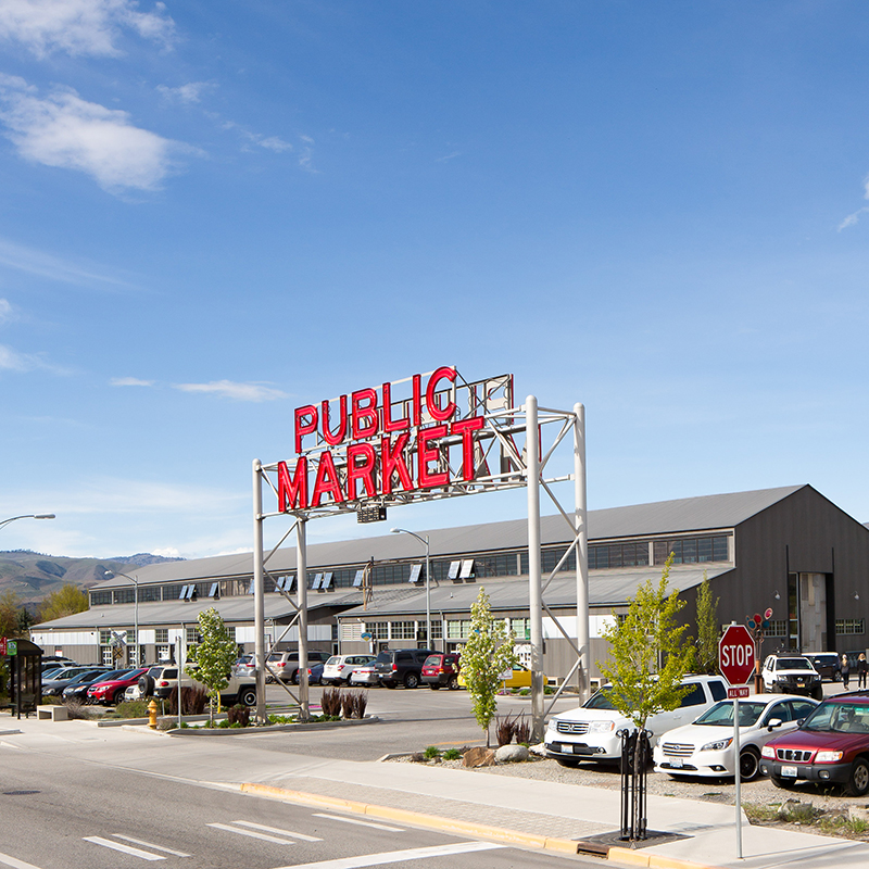 View of Pybus Market with the large "Public Market" red neon sign out front.