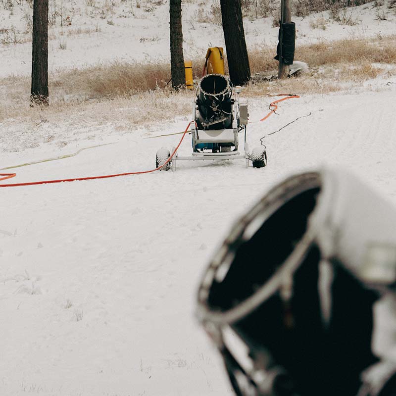 Two snow guns sitting idle on Mimi at Mission Ridge