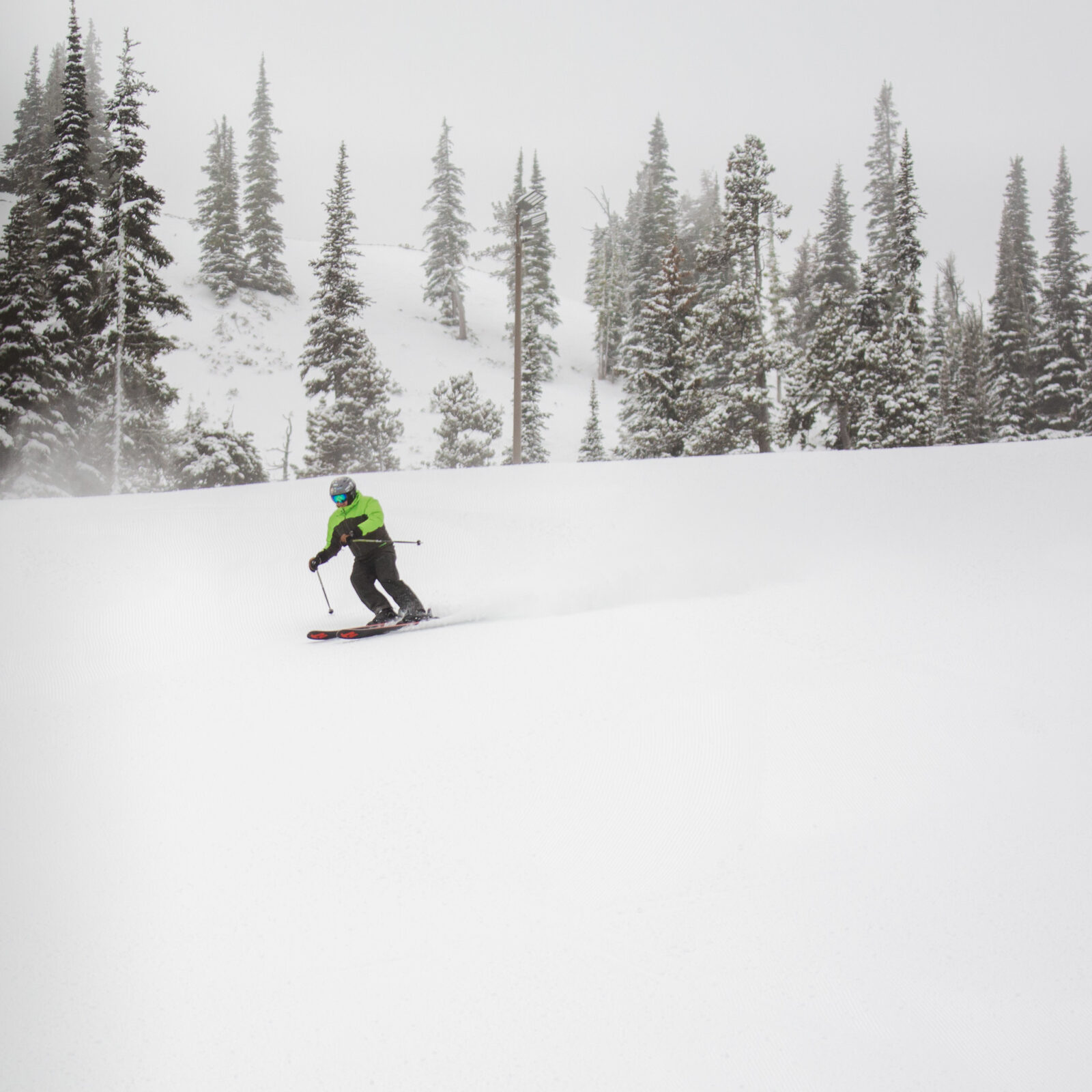 Skier in green jacket on Tumwater