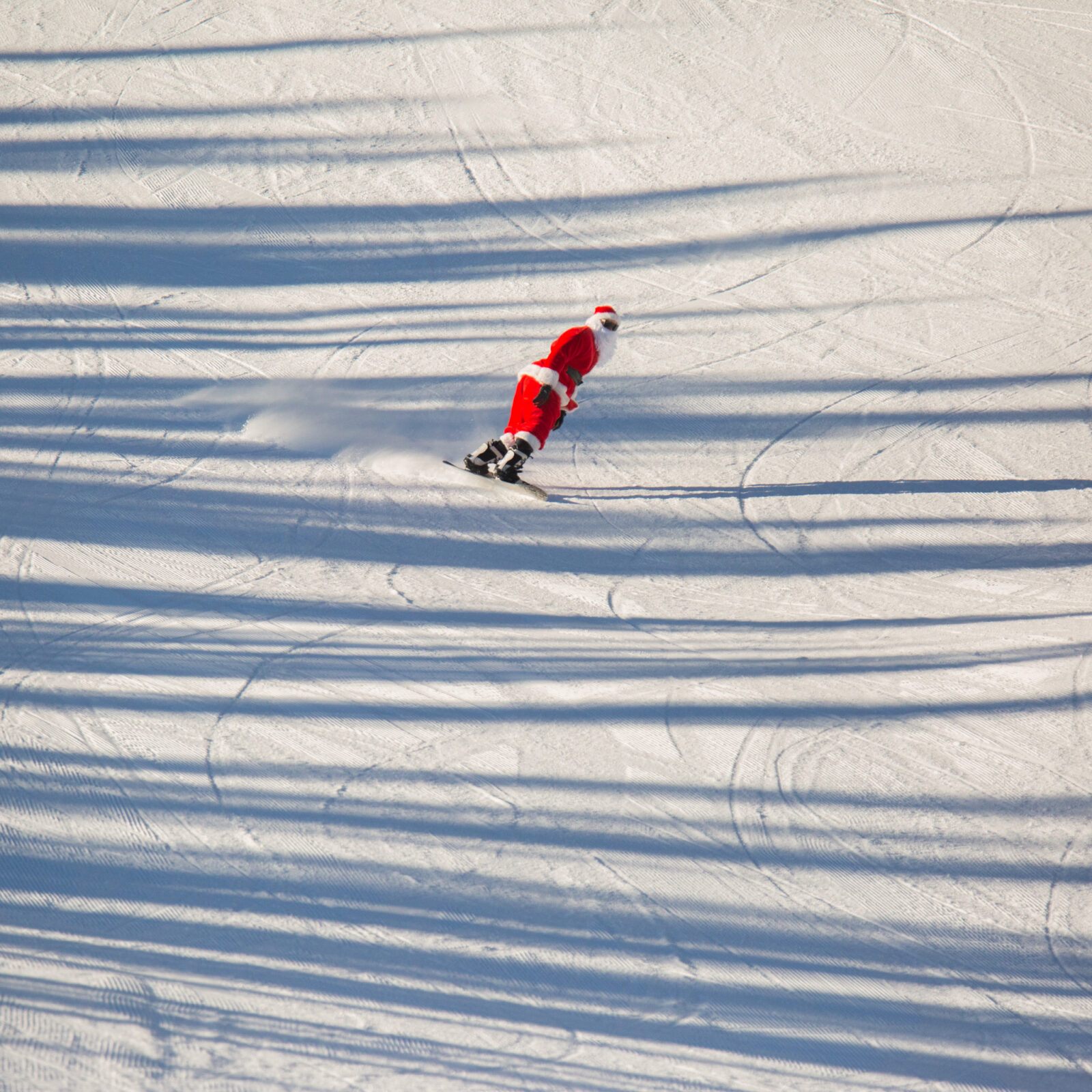 Santa coming down the fun park.