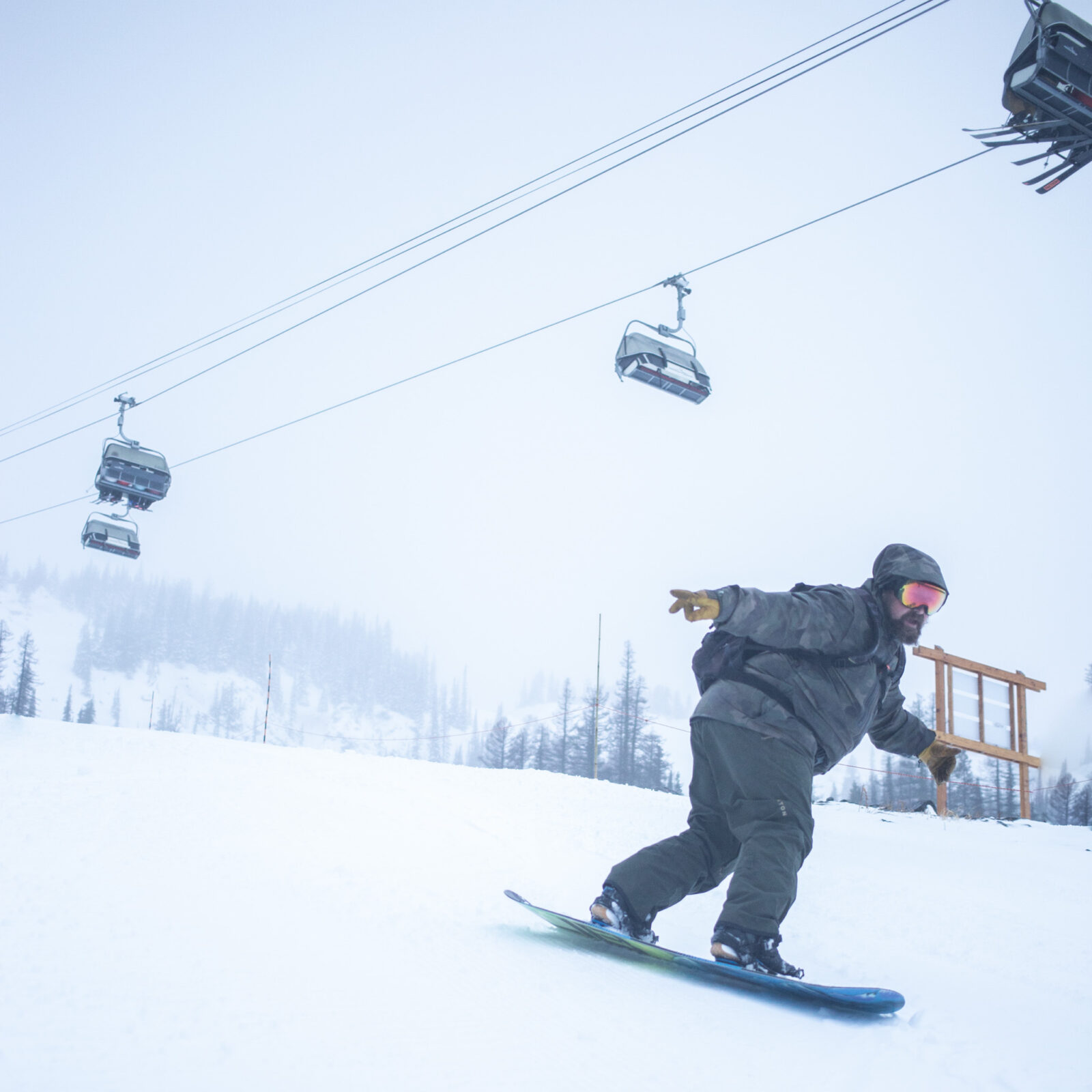 Snowboarder with backpack on Tumwater