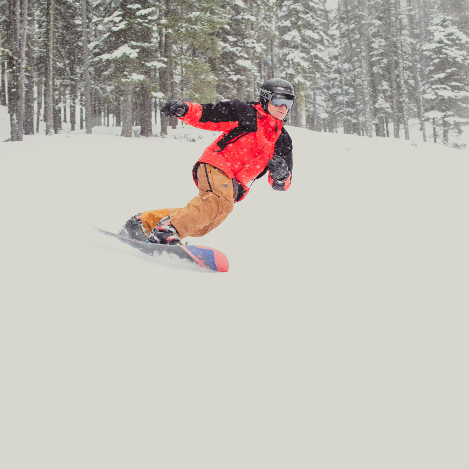 Snowboarder taking turns on Tumwater.