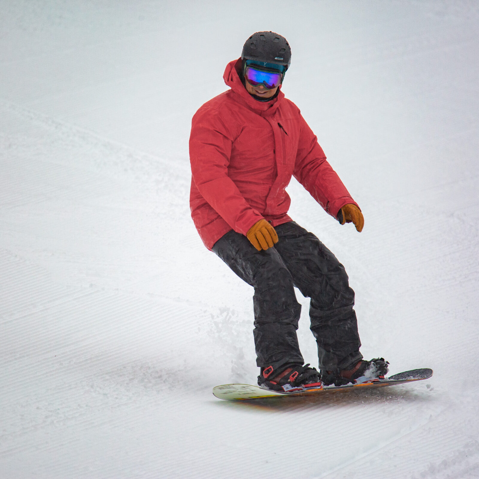 snowboarder on chair 3, rainy day
