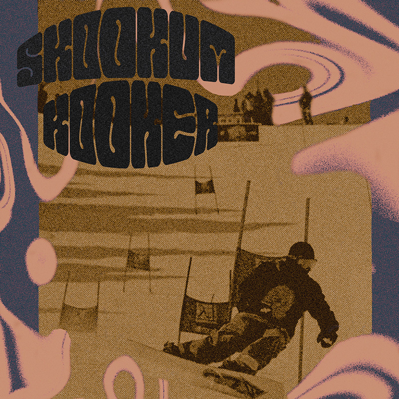 Psychedelic graphic with words "Skookum Kooker" and image of snowboarder racing around gates.