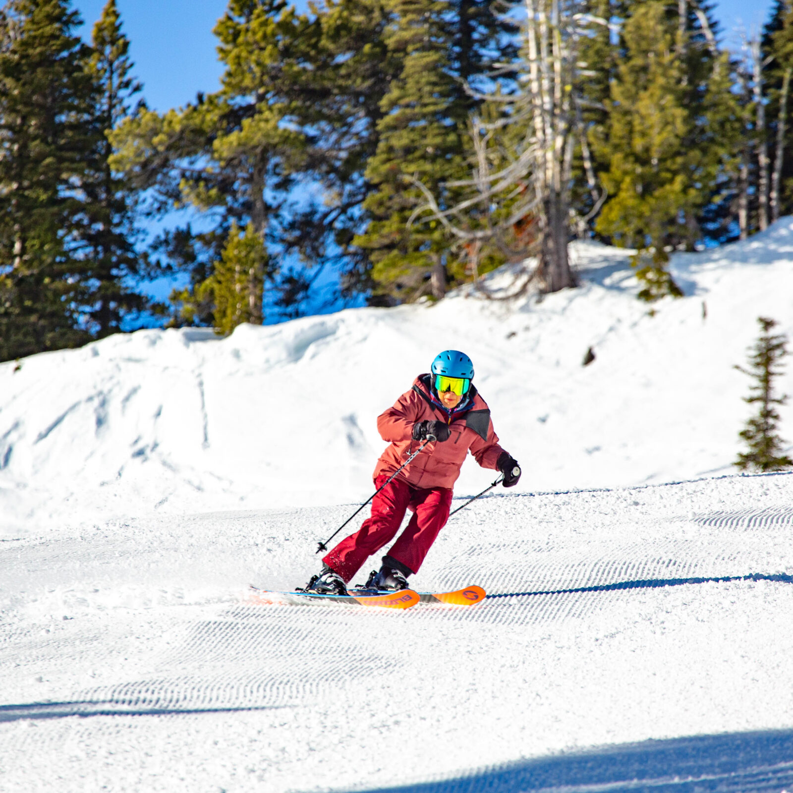 Skier in pink carves into Bomber Bowl