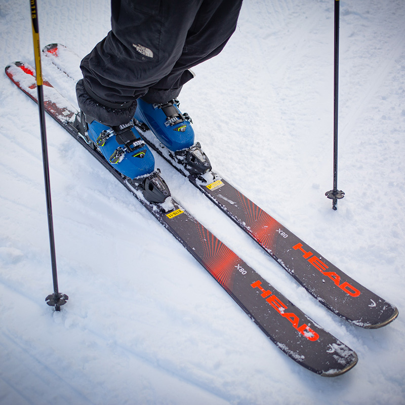 Head performance rental equipment including skis, bindings, boots, and poles.