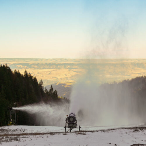 Multiple snowmaking guns firing on Mimi Trail at Mission Ridge