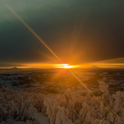 Sunset over Mount Rainier and Mount Adams from Mission Ridge.