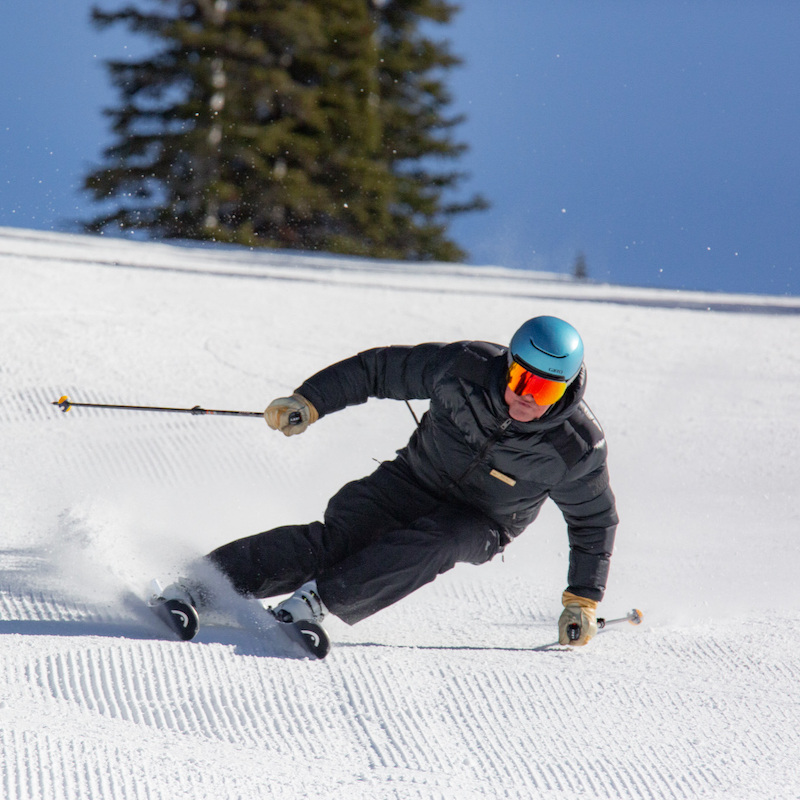 Mark Music, the Ski school director at Mission Ridge, carves deep into a turn on fresh corduroy.