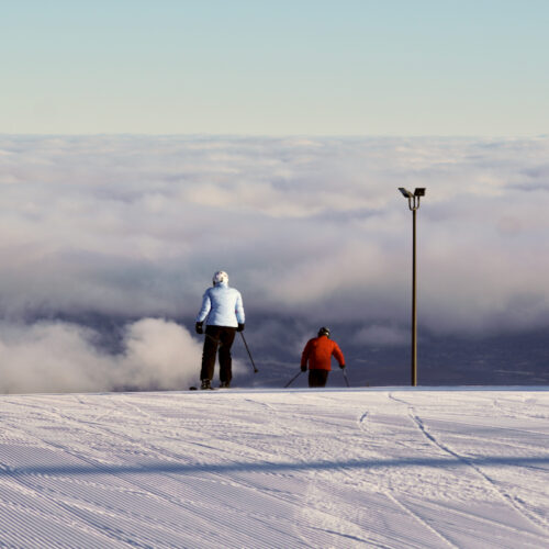 Skiers descend the Sunspot Trail at Mission Ridge, above the cloud inversion.