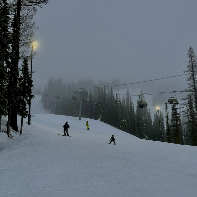Skier descend the Tumwater trail at Mission Ridge in the eveining