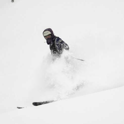 A skier slashes through fresh powder at Mission Ridge.