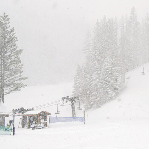 Snow falls heavily in the Mission Ridge base area.