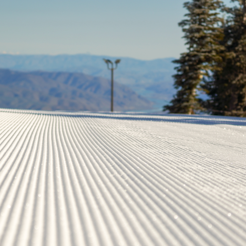 Corduroy on the Sunspot trail at Mission Ridge overlooking the valley.