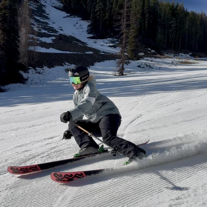 woman carving skis