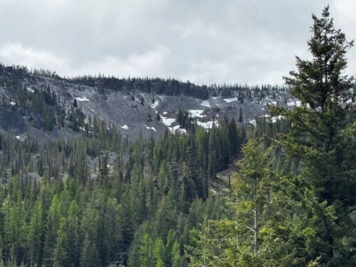 A dusting of new snow looking up at the upper ridgeline of Bowl 4 at Mission Ridge