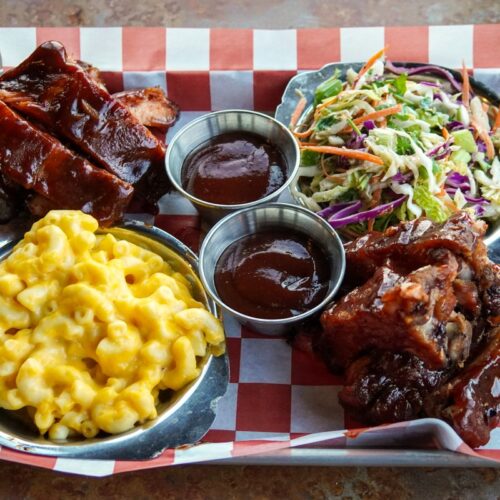 Tray of barbecue ribs, mac and cheese, coleslaw, and sauce from the Chair 5 Pub at Mission Ridge