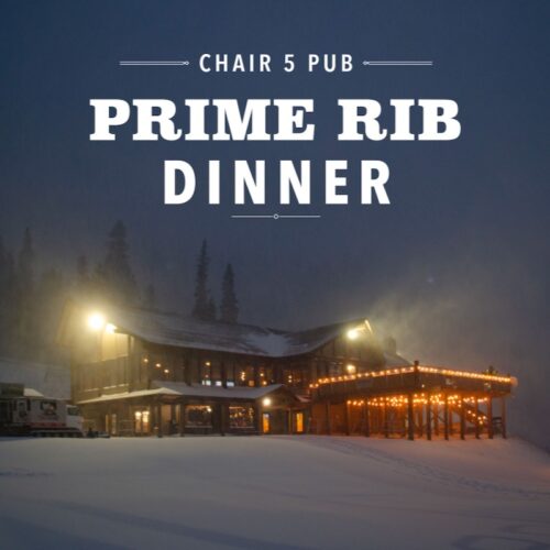 Chair 5 Pub Prime Rib Dinner title over the lodge lit up at night in falling snow